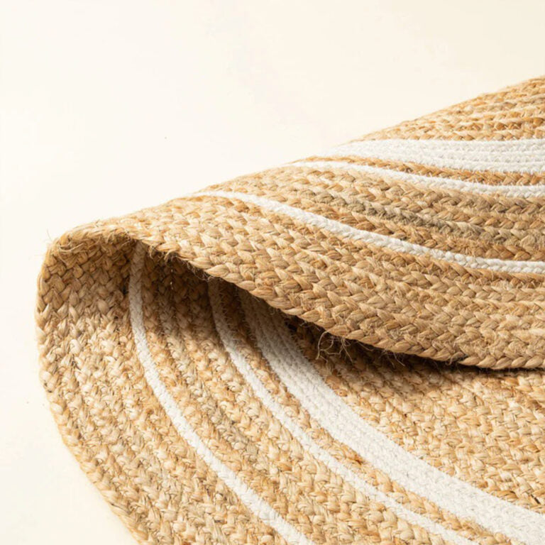 Brown and white round jute rug featured — handwoven natural fibre
