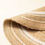Brown and white round jute rug featured — handwoven natural fibre
