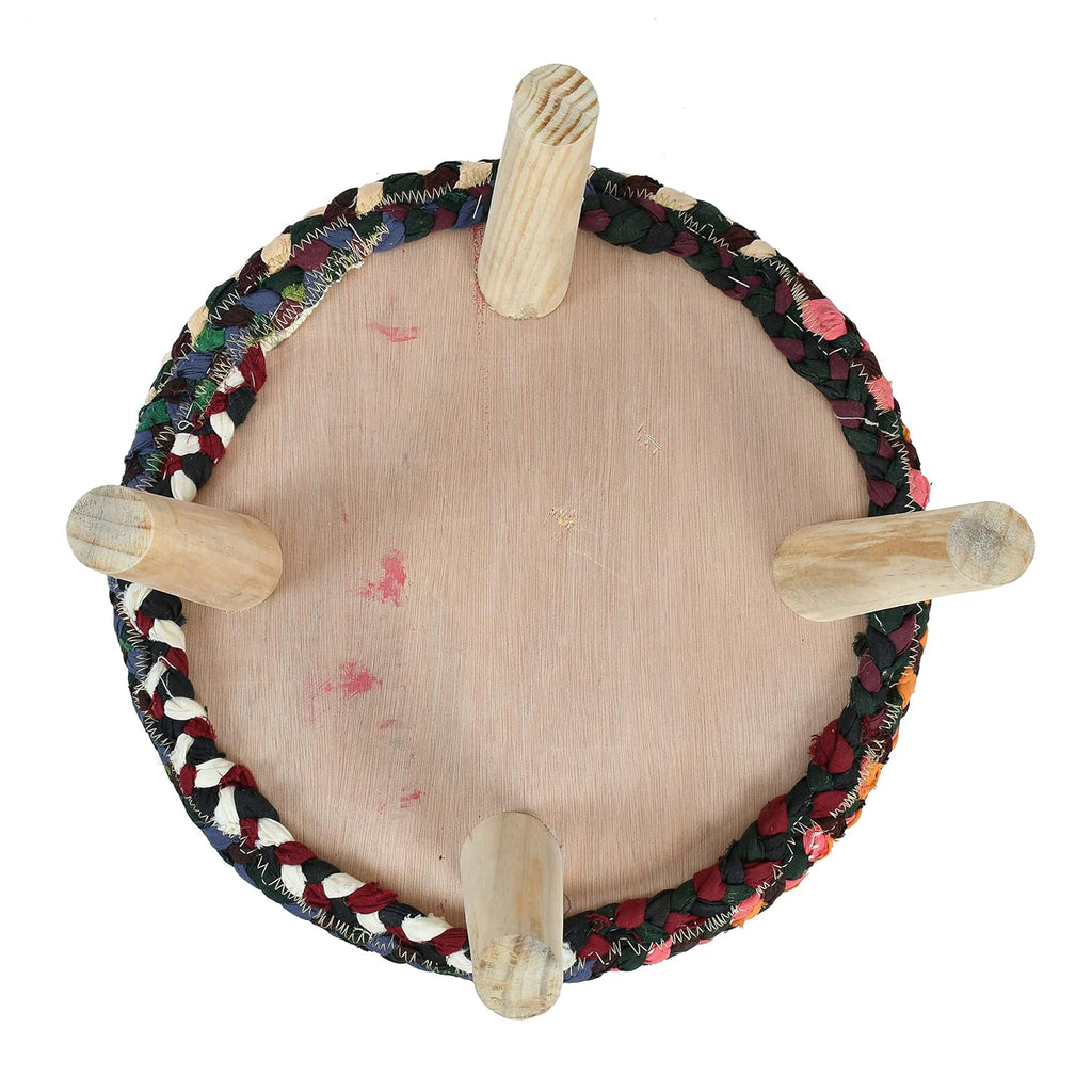 Multi color jute ottoman chair used as a footrest