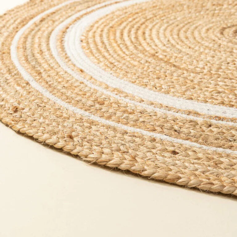 Brown and white round jute rug from above — handwoven India