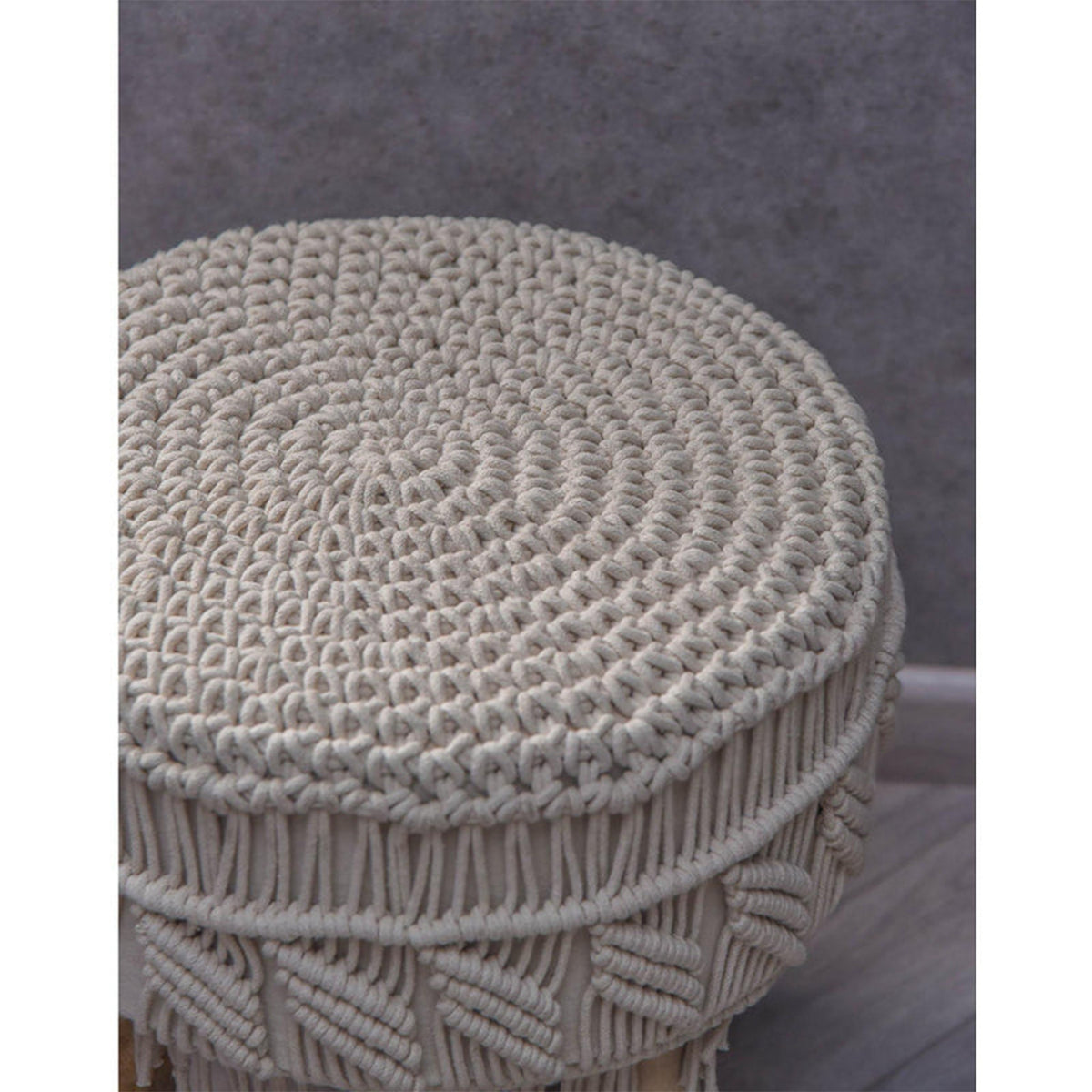 Macrame round ottoman chair styled in living room