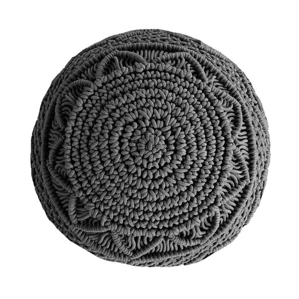 Macrame pouf ottoman in a living room setting