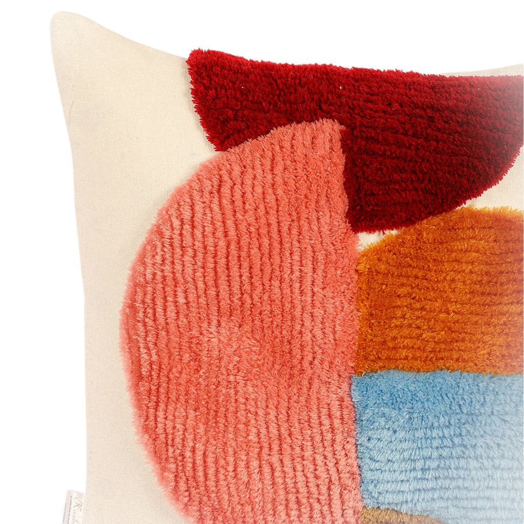 Close-up of tufted texture and circle detailing on cushion cover