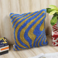 Multicolor hand-tufted cushion cover styled on sofa