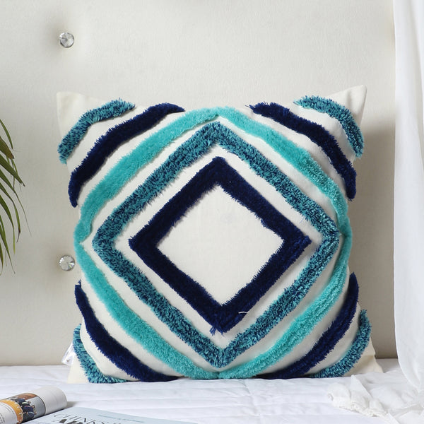 Concentric diamond hand-tufted cushion cover styled on a sofa