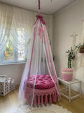 Luxurious macrame swing bed with canopy