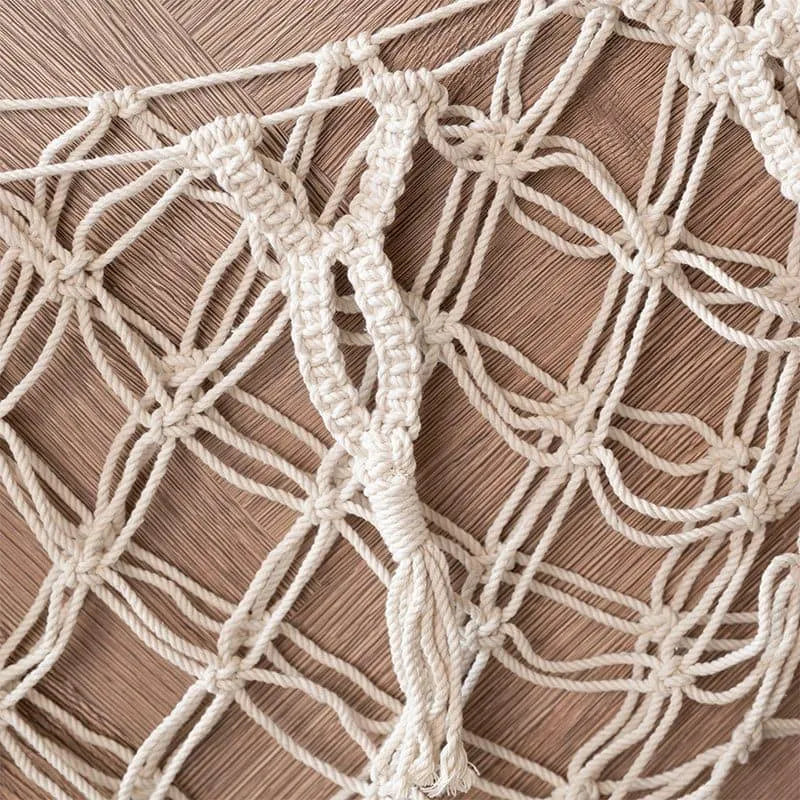 Soft white macrame toy hammock hook detail