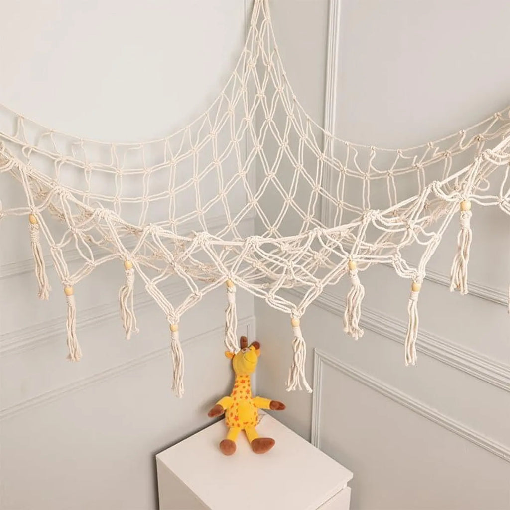White macrame toy hammock net weave detail
