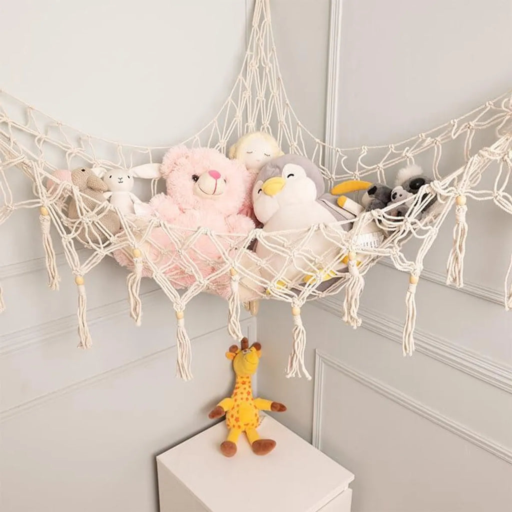 White macrame toy hammock with wooden beads