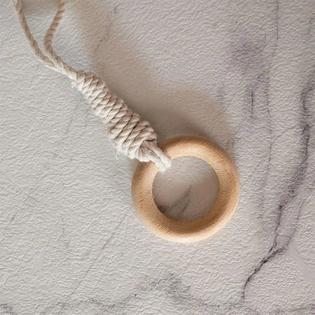Soft white macrame toy hammock weave detail